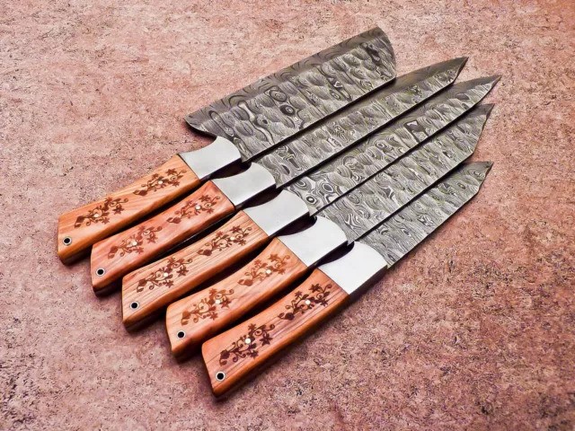 Ergonomic wood handle on full tang Damascus steel kitchen knife