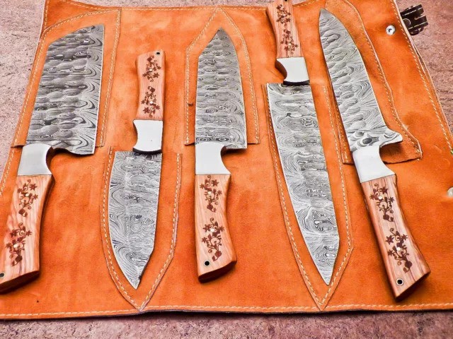 5-piece Damascus steel chef knife set with wood handles and leather roll bag