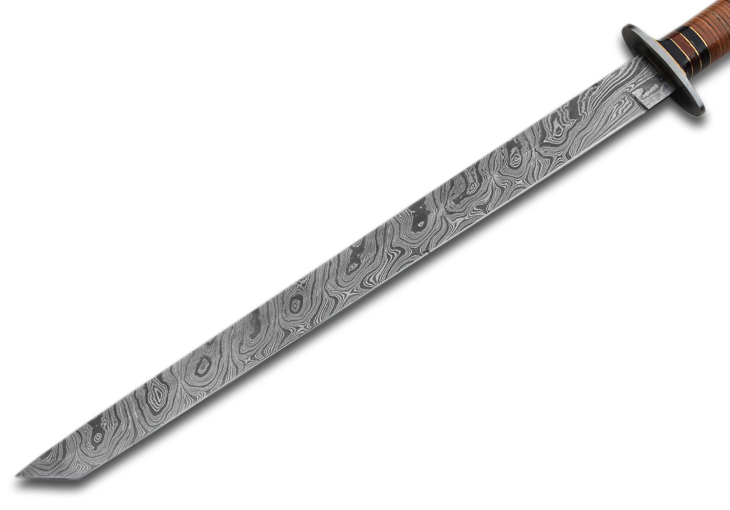 Forged Damascus steel blade with visible wave pattern and sharp edge