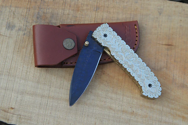 folder knife with leather sheath