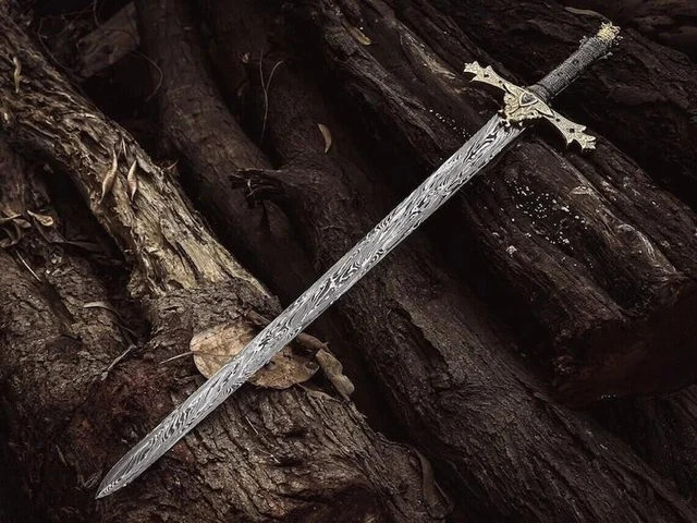 Handmade Damascus Viking sword with leather sheath, full view on wooden background