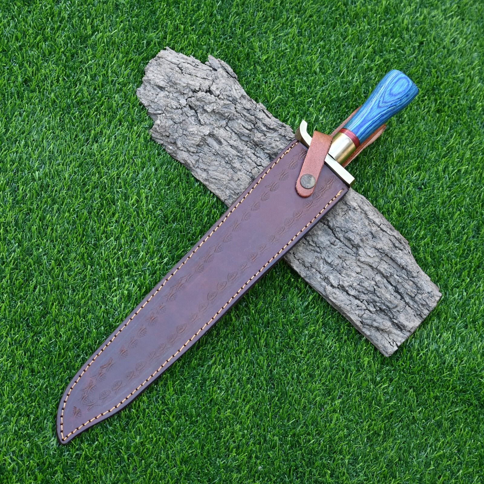 Wooden handle and brass guard of handmade Damascus steel dagger