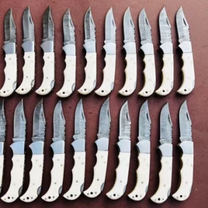 Damascus folding knife fully opened showing back lock mechanism